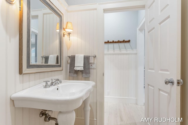 1749 Sunset Point Dr, Norton Shores, MI 49441 - bathroom with wood finished floors and a sink