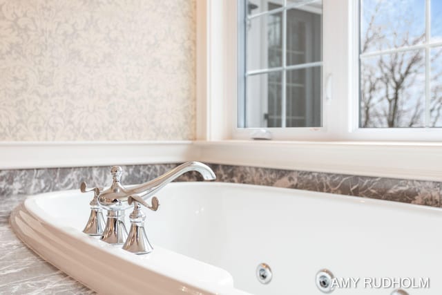 1749 Sunset Point Dr, Norton Shores, MI 49441 - bathroom featuring wallpapered walls and a tub with jets