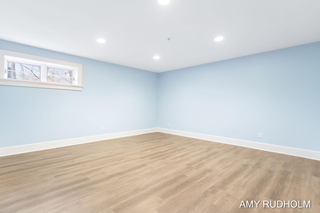 1749 Sunset Point Dr, Norton Shores, MI 49441 - spare room with light wood-type flooring, baseboards, and recessed lighting