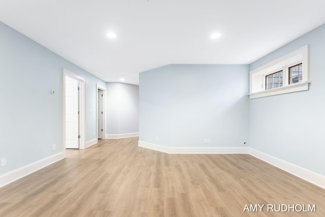 1749 Sunset Point Dr, Norton Shores, MI 49441 - spare room featuring baseboards, light wood-style flooring, and recessed lighting