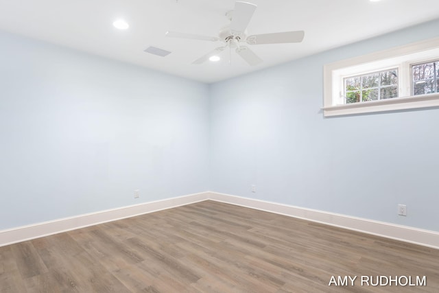 1749 Sunset Point Dr, Norton Shores, MI 49441 - spare room with wood finished floors, recessed lighting, baseboards, and ceiling fan