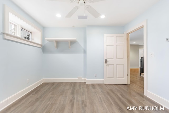 1749 Sunset Point Dr, Norton Shores, MI 49441 - unfurnished room with light wood finished floors, baseboards, a ceiling fan, and recessed lighting