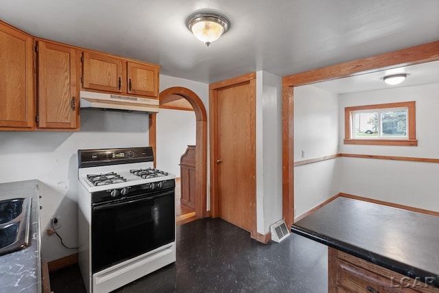 kitchen with white range with gas stovetop and sink