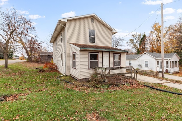 front facade with a front yard