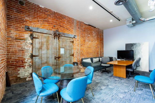 interior space with brick wall