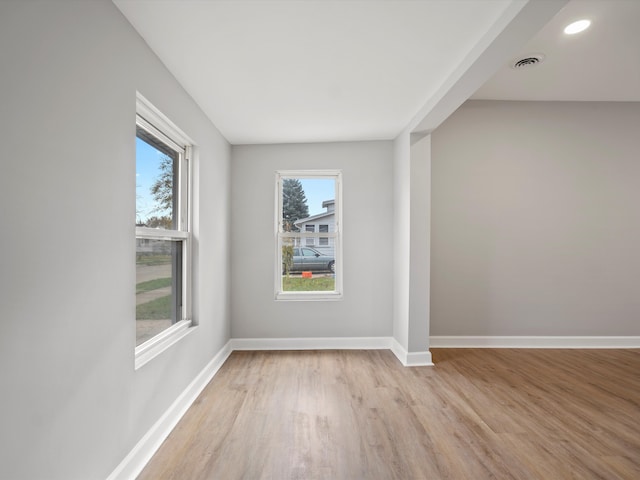 empty room with light wood-type flooring