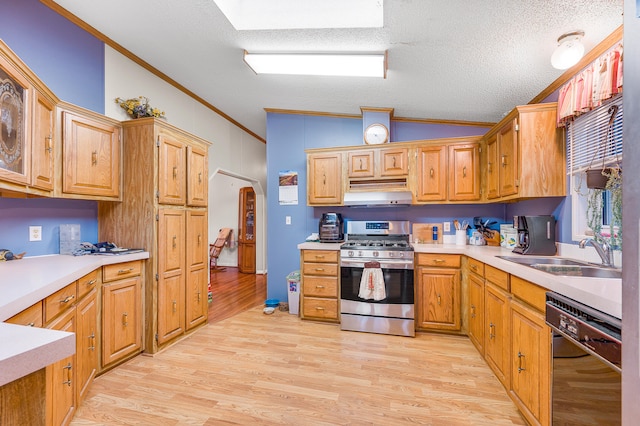 kitchen with sink, black dishwasher, stainless steel range with gas cooktop, crown molding, and vaulted ceiling