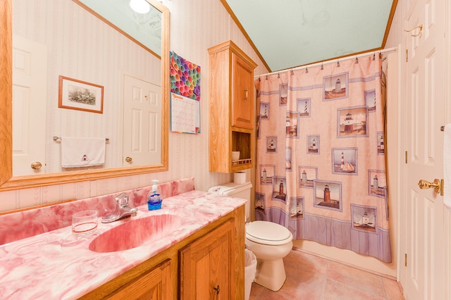 full bathroom with tile patterned floors, vanity, a textured ceiling, shower / bath combo with shower curtain, and toilet