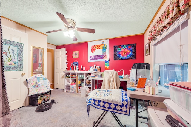 carpeted office space featuring crown molding, ceiling fan, and a textured ceiling