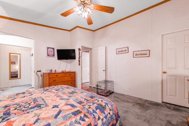 carpeted bedroom featuring ceiling fan and ornamental molding