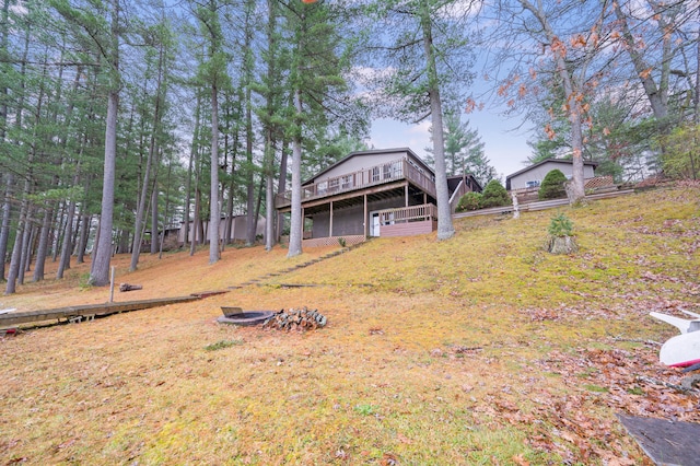 view of yard with a wooden deck