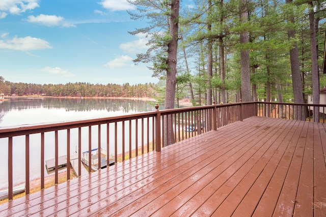 deck featuring a water view