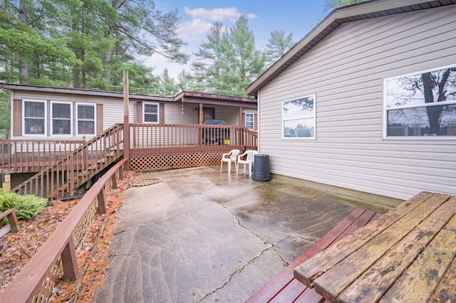 wooden deck featuring a patio