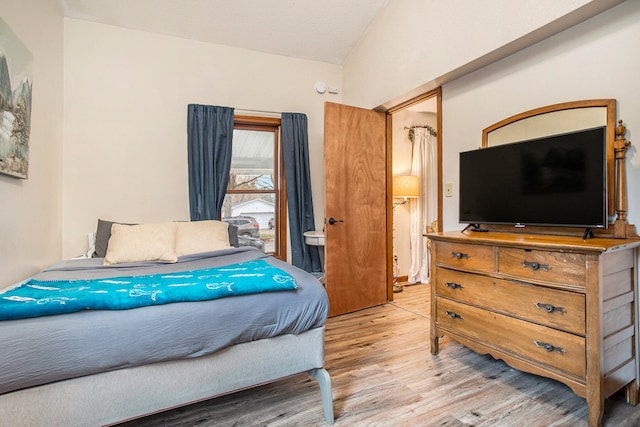 bedroom with light hardwood / wood-style flooring