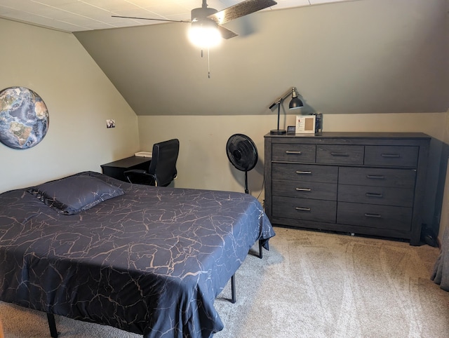 carpeted bedroom featuring ceiling fan and lofted ceiling