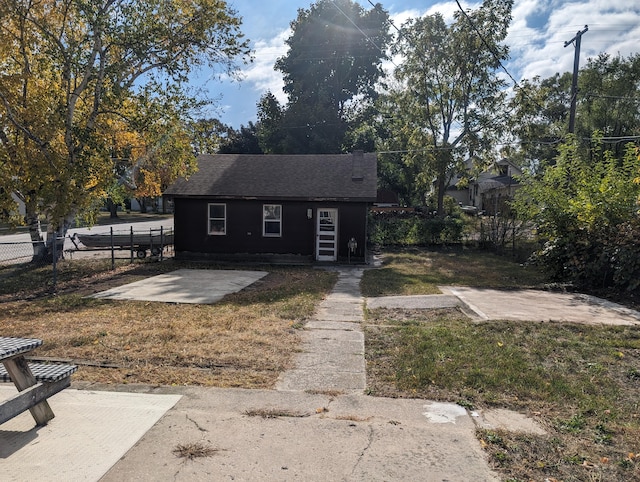 bungalow-style home featuring a patio