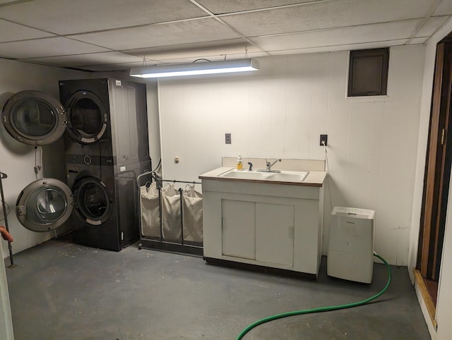 laundry room with sink and stacked washing maching and dryer