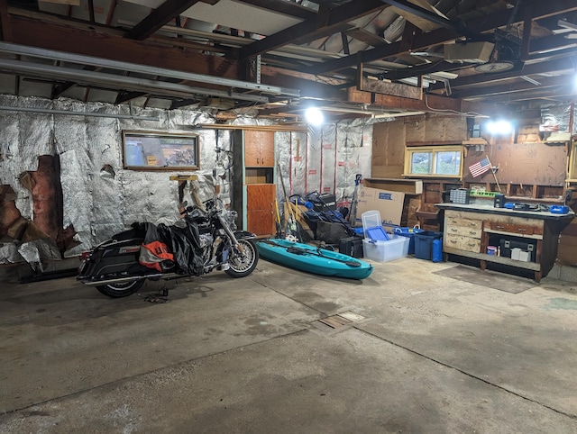 basement with a workshop area