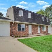 view of front of property with a front lawn