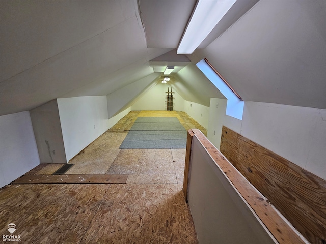 bonus room with vaulted ceiling