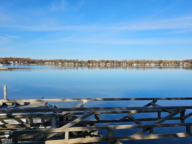 dock area featuring a water view