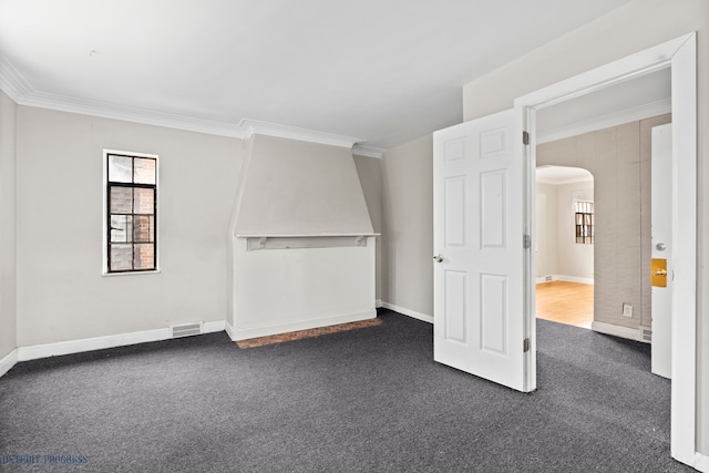 carpeted empty room with ornamental molding