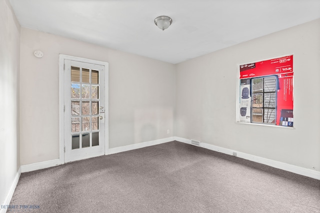 view of carpeted spare room