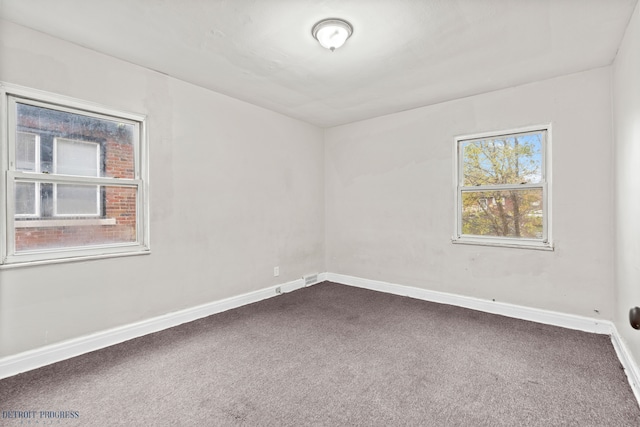 view of carpeted spare room