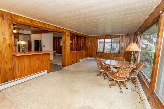 21734 N Channel Pkwy, Edwardsburg, MI 49112 - sunroom / solarium featuring a baseboard heating unit