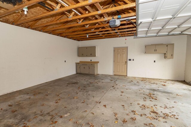 21734 N Channel Pkwy, Edwardsburg, MI 49112 - garage featuring a garage door opener