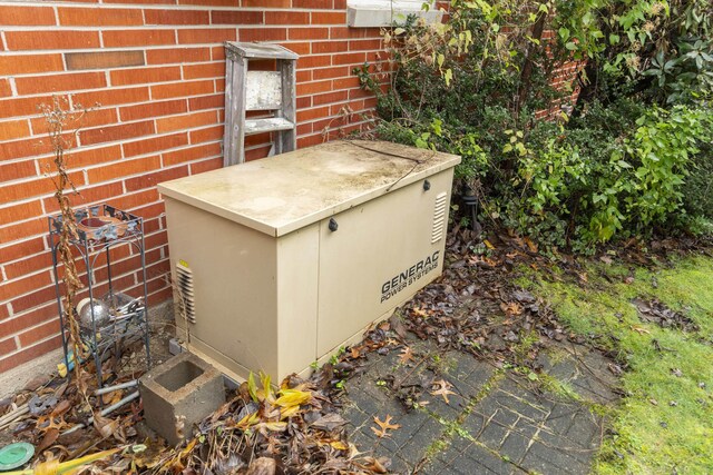 21734 N Channel Pkwy, Edwardsburg, MI 49112 - exterior view of a power unit and brick siding
