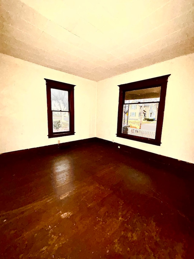 empty room featuring plenty of natural light