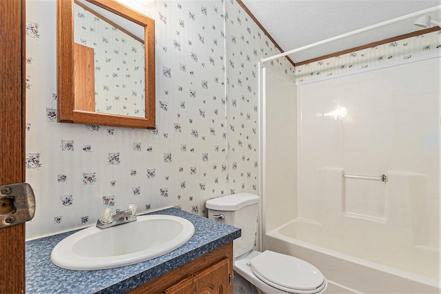 full bathroom with vanity, a textured ceiling, shower / bath combination, and toilet