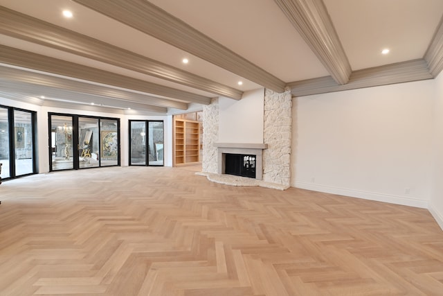 unfurnished living room featuring crown molding, a stone fireplace, light parquet flooring, and beam ceiling