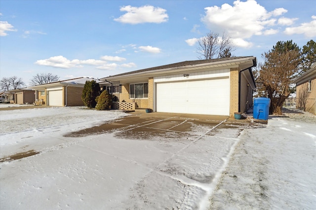 ranch-style house featuring a garage