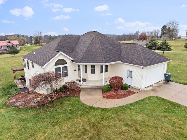 single story home with a front yard and a garage