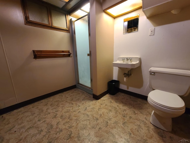 bathroom featuring toilet