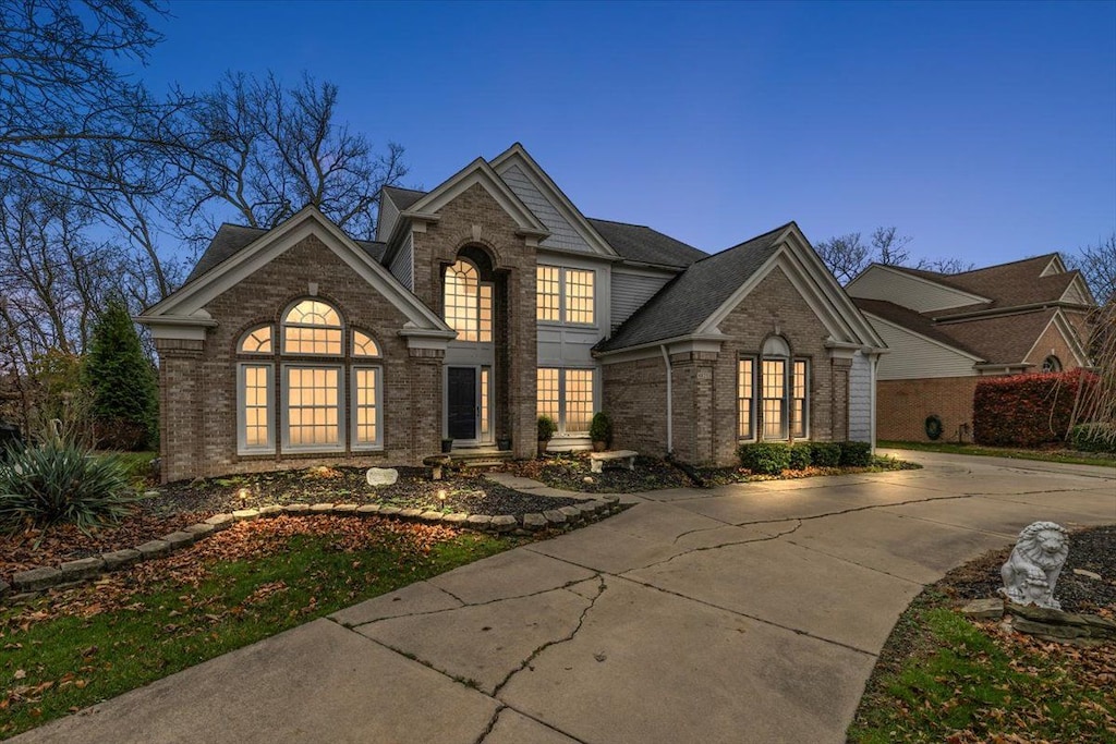 48253 Red Run Dr, Canton, MI 48187 - view of front facade with brick siding and driveway