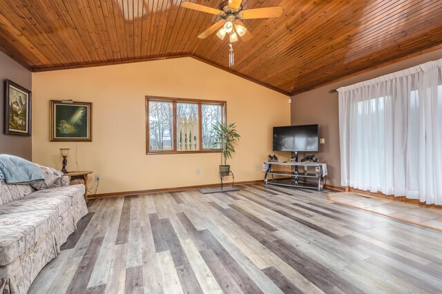 18980 16 Mile Rd, Marshall, MI 49068 - living room featuring vaulted ceiling, a ceiling fan, wood ceiling, wood finished floors, and baseboards