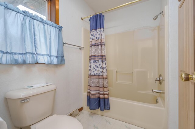 18980 16 Mile Rd, Marshall, MI 49068 - bathroom featuring shower / bath combo with shower curtain and toilet