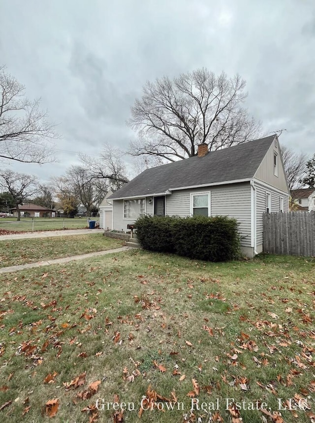 view of property exterior with a lawn