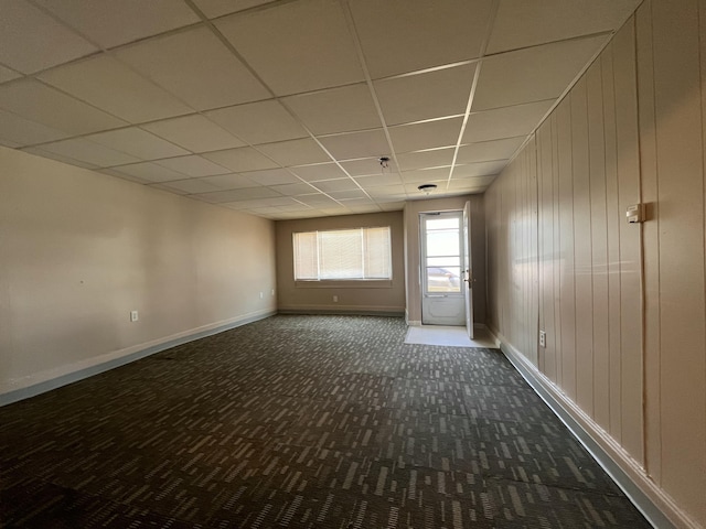 25846 W 7 Mile Rd, Redford, MI 48240 - carpeted empty room with a paneled ceiling and baseboards