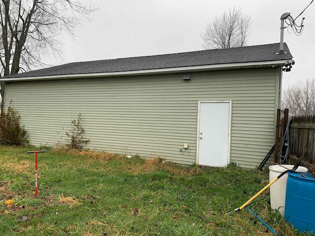 view of outdoor structure with a yard