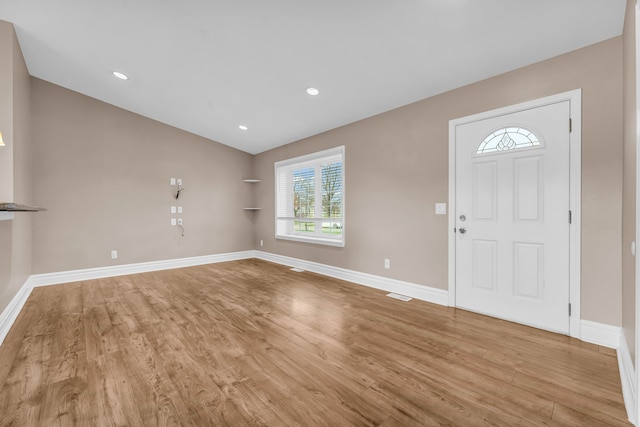 entryway with light hardwood / wood-style flooring