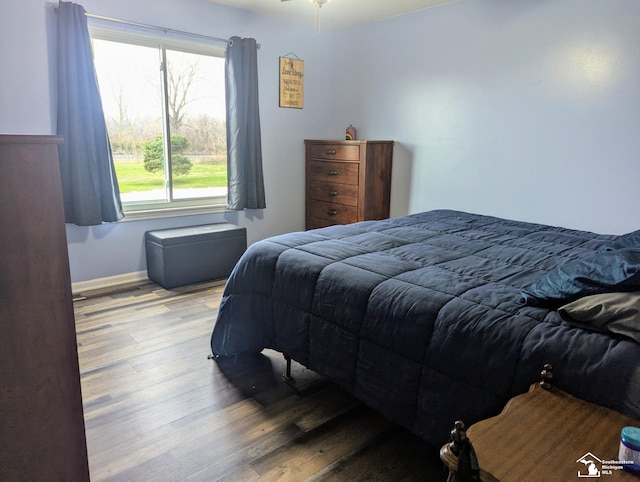 bedroom featuring hardwood / wood-style flooring