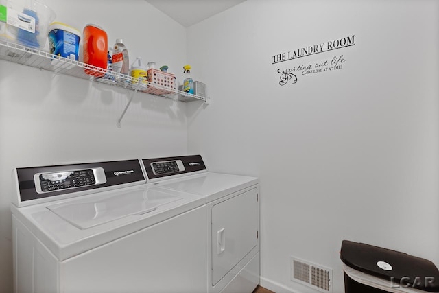 laundry room featuring independent washer and dryer