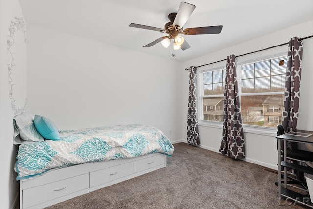 bedroom with ceiling fan and carpet floors