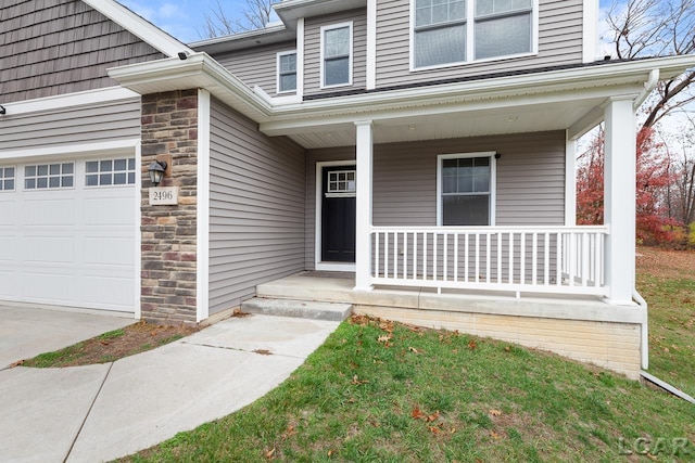 doorway to property featuring a garage