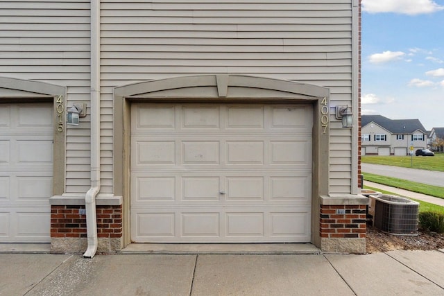 garage featuring central AC unit