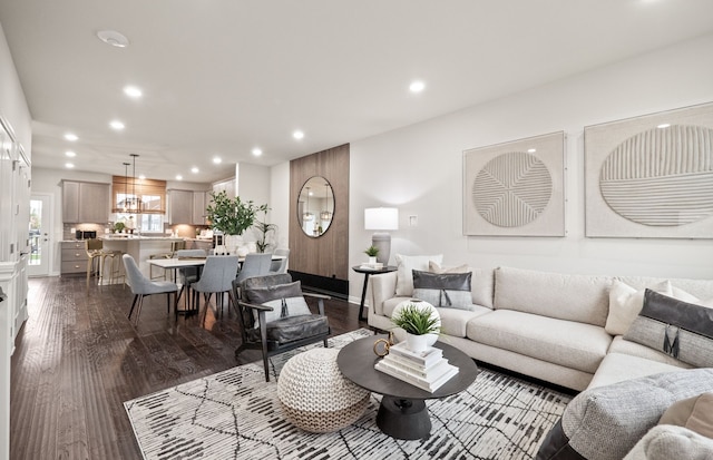 living room with dark hardwood / wood-style floors